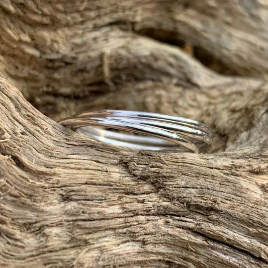 Stacking rings on a log 